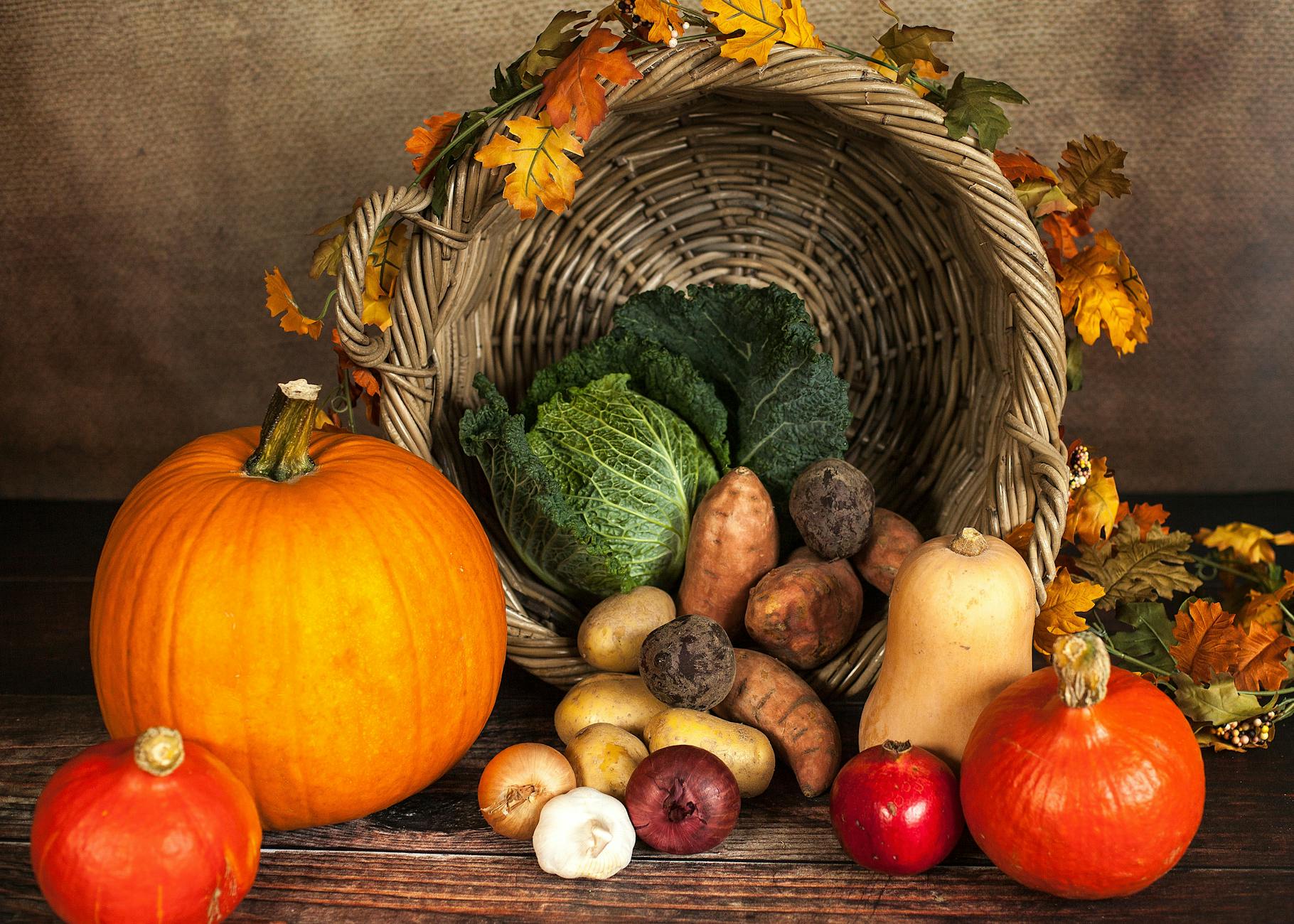 vegetable and crops beside spilled basket