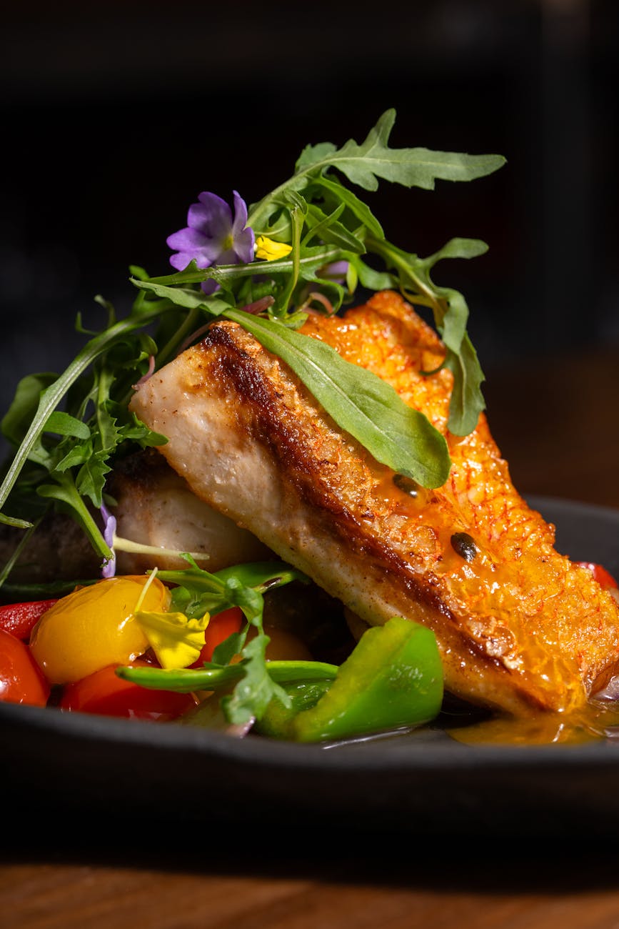 gourmet grilled salmon dish with vegetables